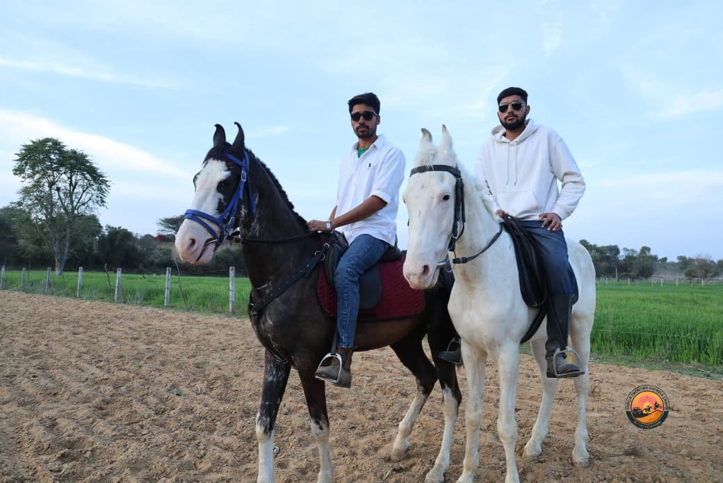 Two Riders on Horseback